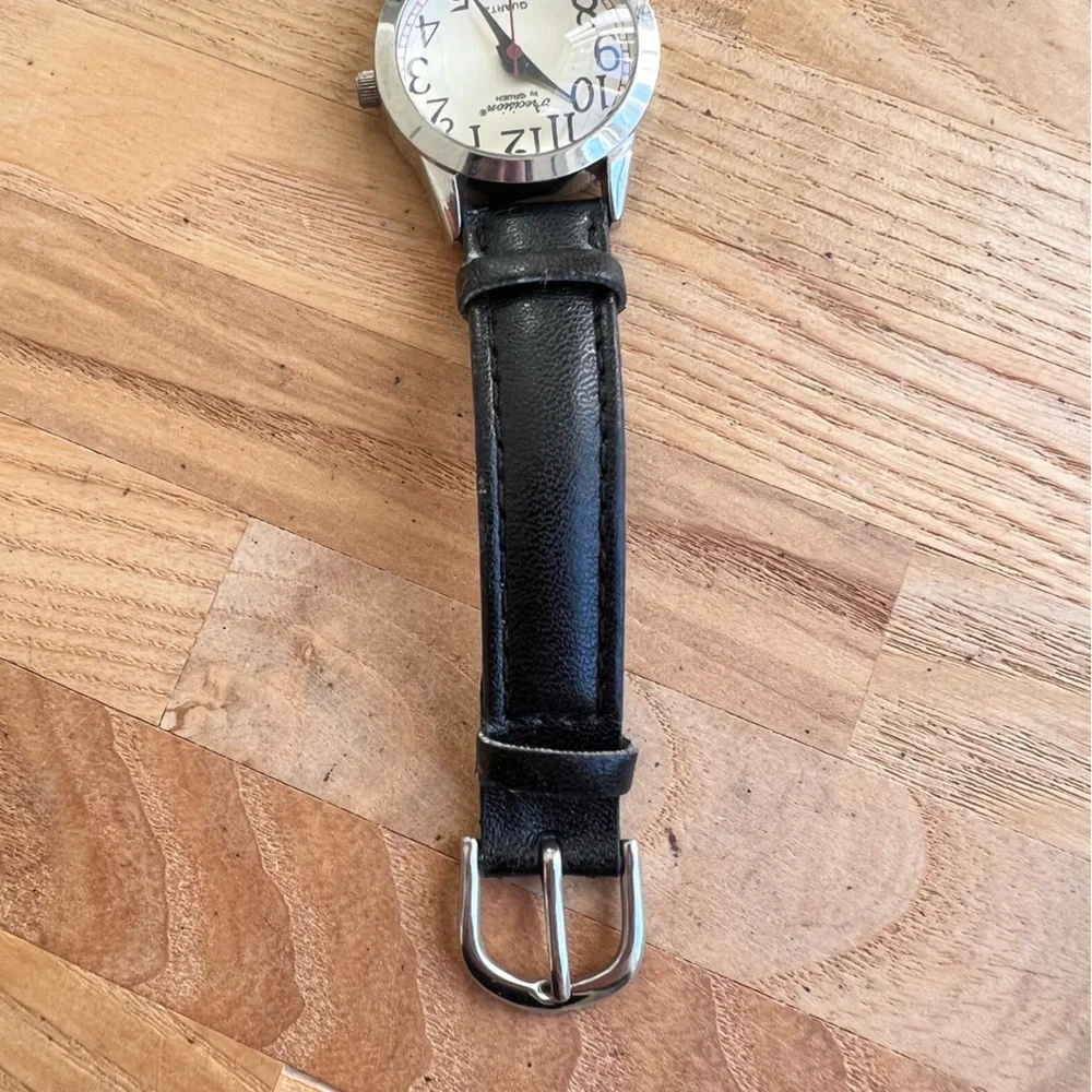 Precision by Gruen ladies silver tone black leather dress watch NEW BATTERY